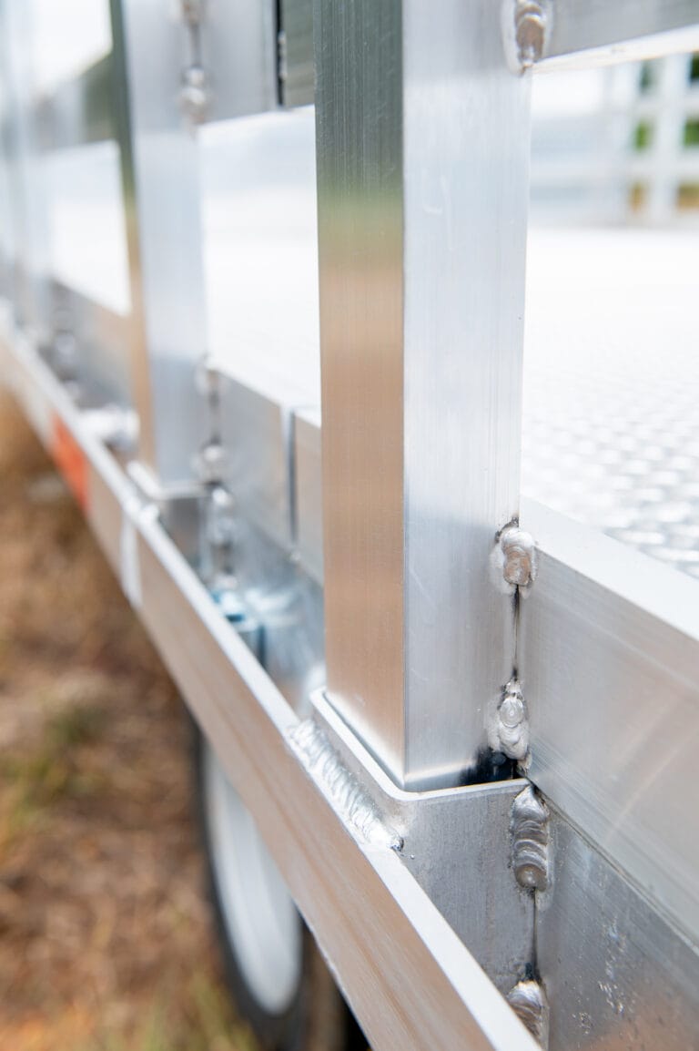 Stake body truck stake connection to bed